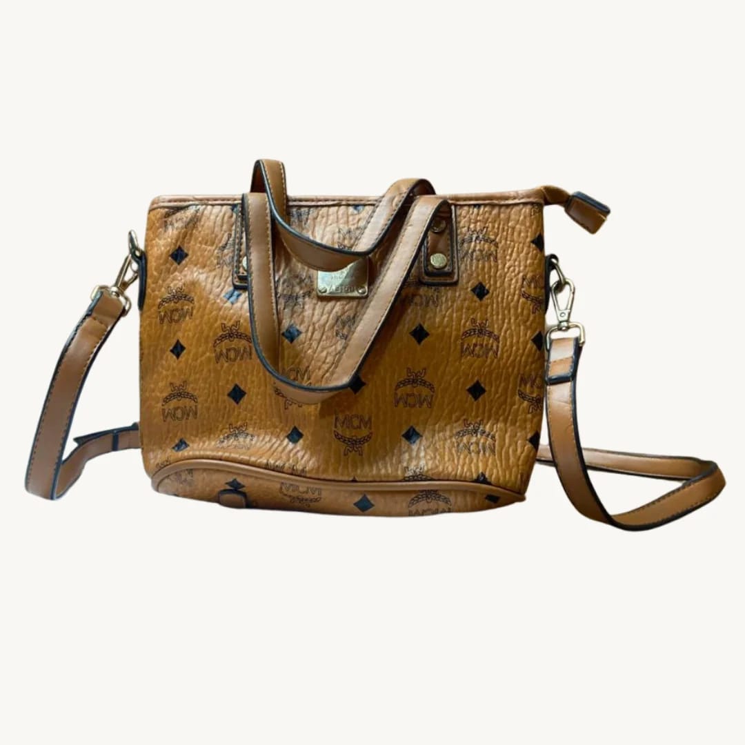 Bolso Mini Tote MCM Munchen en Lona Visetos Cognac con Correa Bandolera