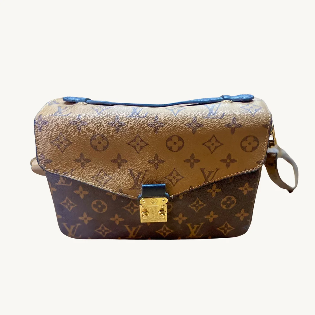 Bolso Louis Vuitton Pochette Métis en Monogram Reverse Canvas