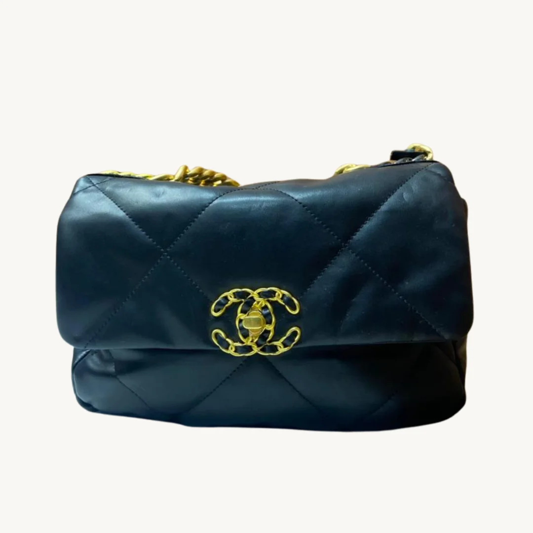 Bolso Tote Coach Mollie en Cuero Pebble Negro con Detalles en Cuero Saddle