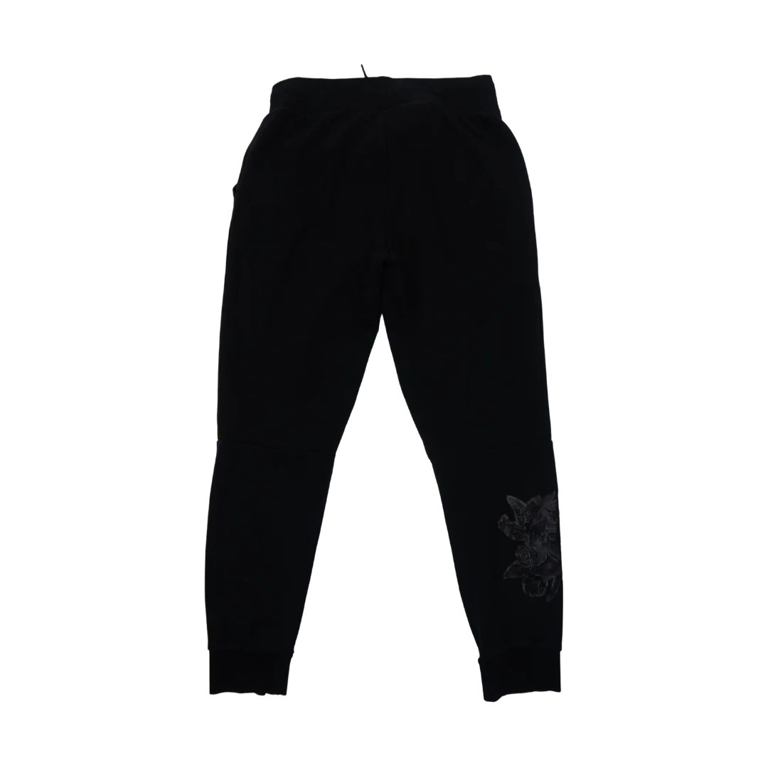 Pantalón de Buzo Adidas Negro de Calce Ajustado