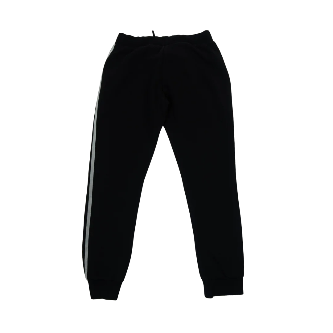 Pantalón de Buzo Adidas Negro de Calce Ajustado — foto 2