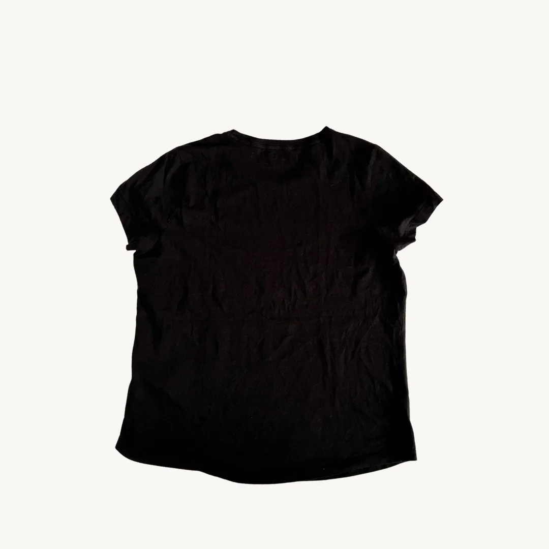 Polera Puma Essentials - Negro con Logo Blanco