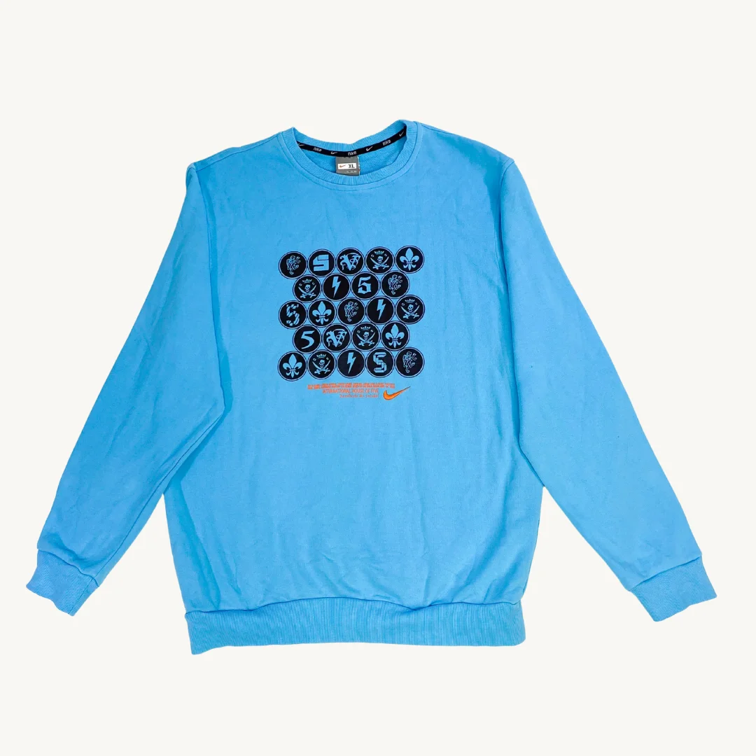 Poleron Nike celeste